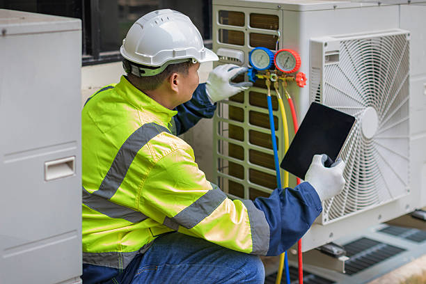 Professional Heat Pump Repair technician working in Baker, FL
